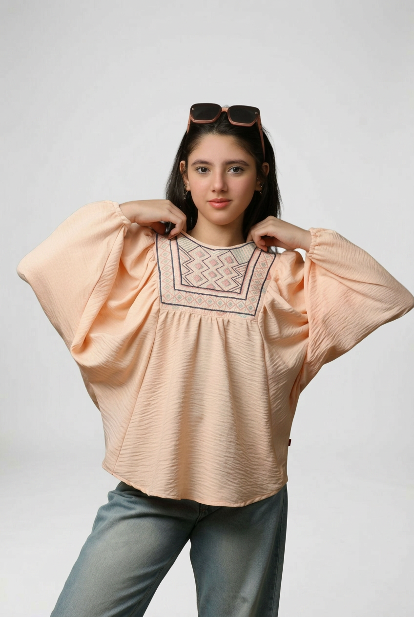 بلوزة أطفال قطنية بتطريز تراثي – اورنج ناعم
